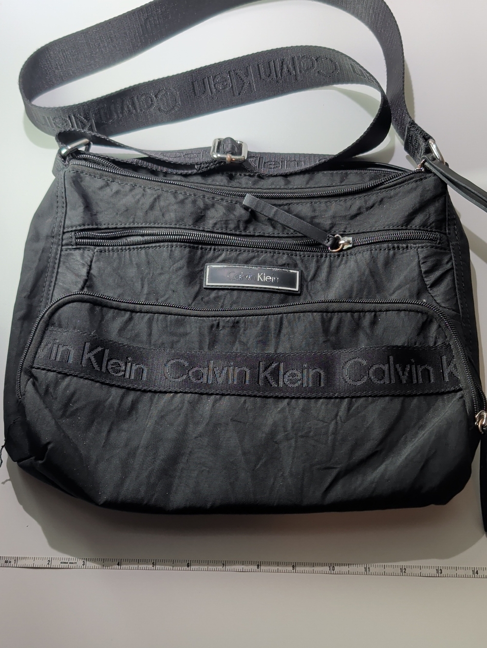 Multiple compartment Calvin Klein vinyl crossbody as is